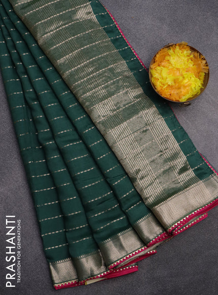 Semi chanderi saree bottle green and pink with allover zari weaves and zari woven & gotapatti lace work border