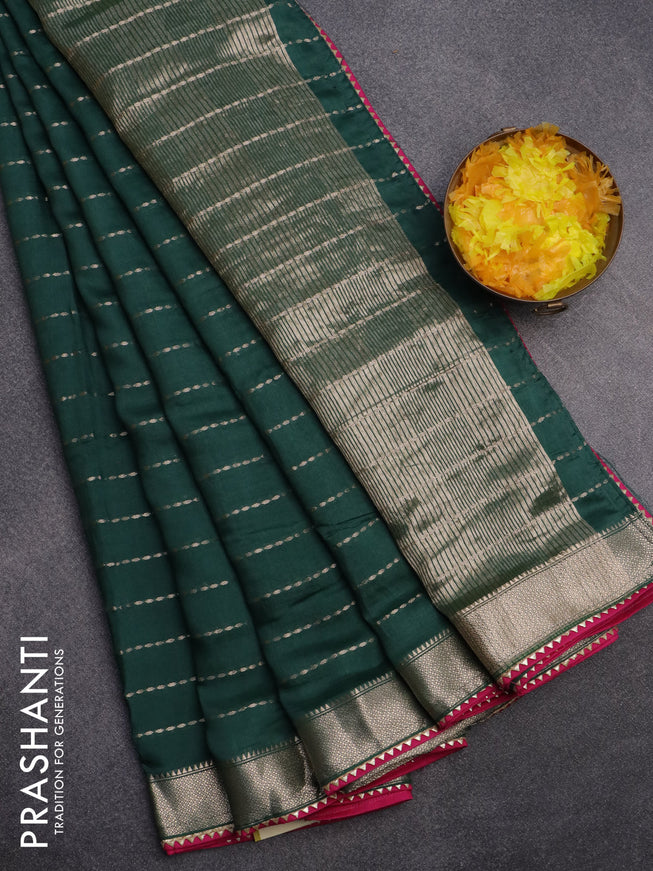 Semi chanderi saree bottle green and pink with allover zari weaves and zari woven & gotapatti lace work border