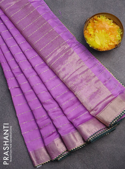 Semi chanderi saree lavender and bottle green with allover zari weaves and zari woven & gotapatti lace work border