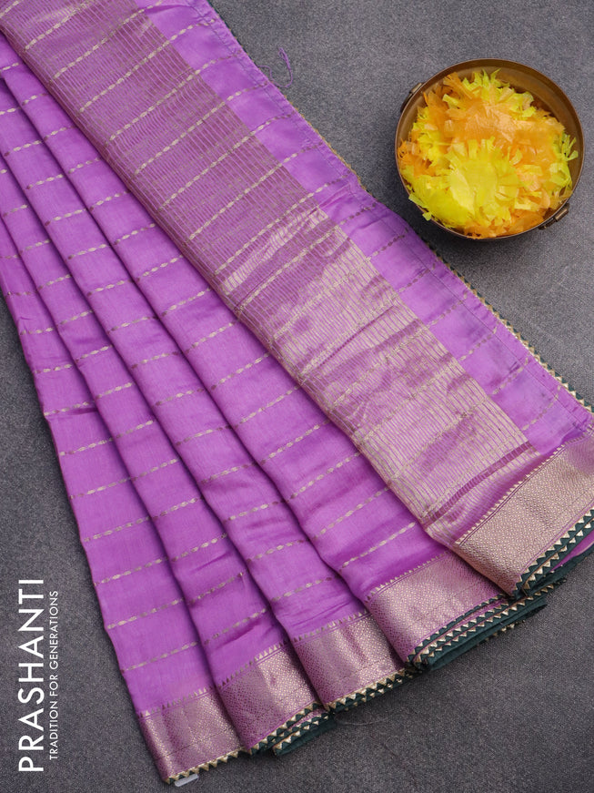 Semi chanderi saree lavender and bottle green with allover zari weaves and zari woven & gotapatti lace work border