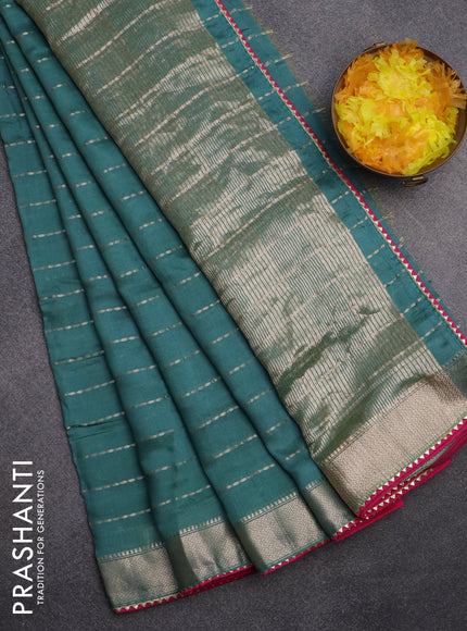 Semi chanderi saree teal green shade and pink with allover zari weaves and zari woven & gotapatti lace work border