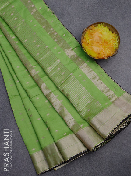 Semi chanderi saree light green and black with allover zari woven buttas and zari woven & gotapatti lace work border