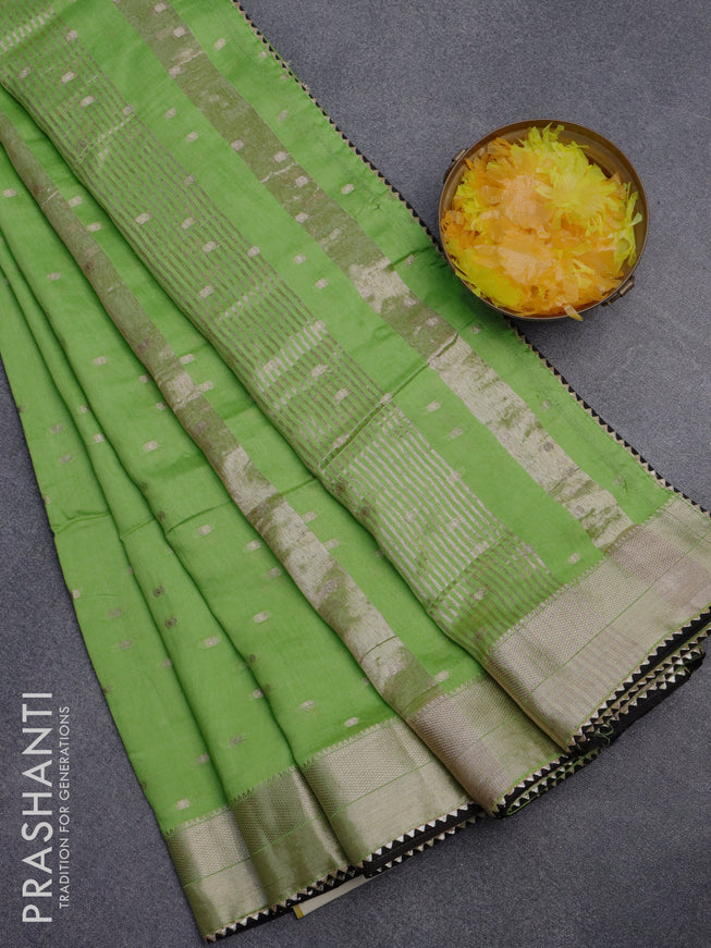 Semi chanderi saree light green and black with allover zari woven buttas and zari woven & gotapatti lace work border