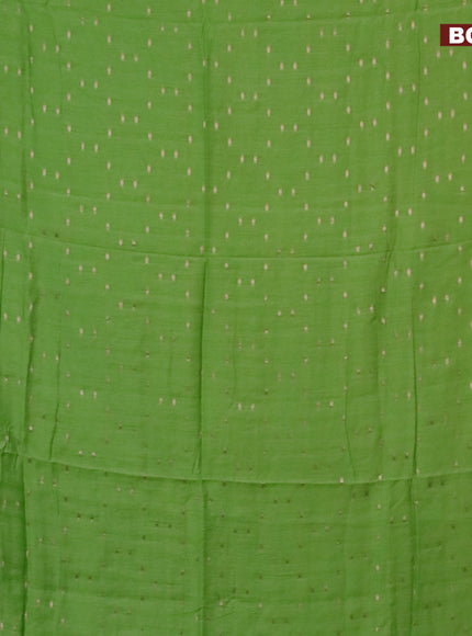 Semi chanderi saree light green and black with allover zari woven buttas and zari woven & gotapatti lace work border