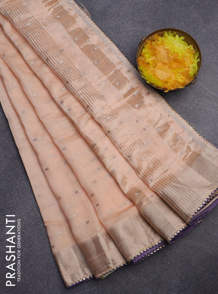 Semi chanderi saree mild peach orange and lavender shade with allover zari woven buttas and zari woven & gotapatti lace work border