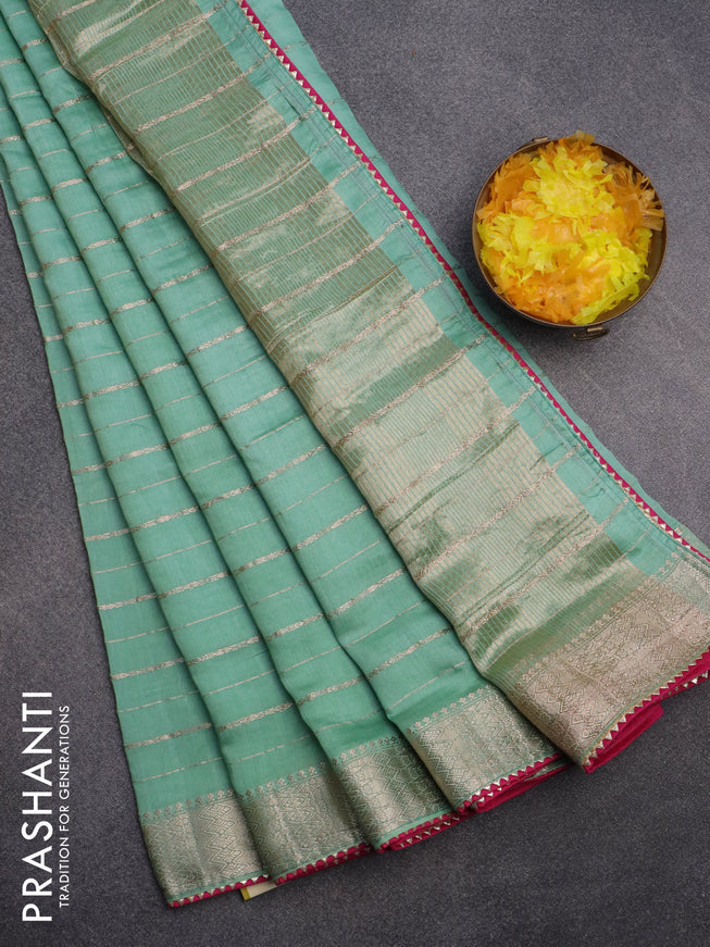 Semi chanderi saree pastel green and pink with allover zari woven stripes pattern and zari woven & gotapatti lace work border