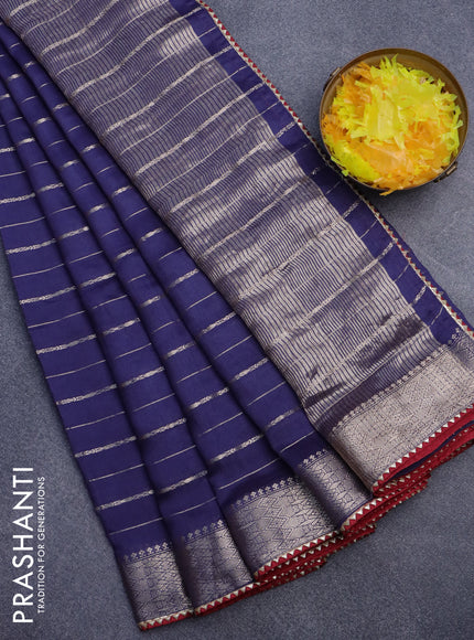 Semi chanderi saree blue and maroon with allover zari woven stripes pattern and zari woven & gotapatti lace work border