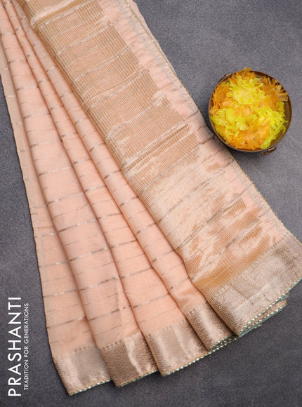 Semi chanderi saree sandal and pastel green with allover zari woven stripes pattern and zari woven & gotapatti lace work border