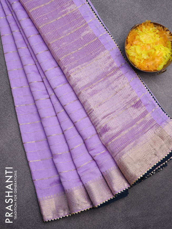 Semi chanderi saree lavender shade and peacock blue with allover zari woven stripes pattern and zari woven & gotapatti lace work border