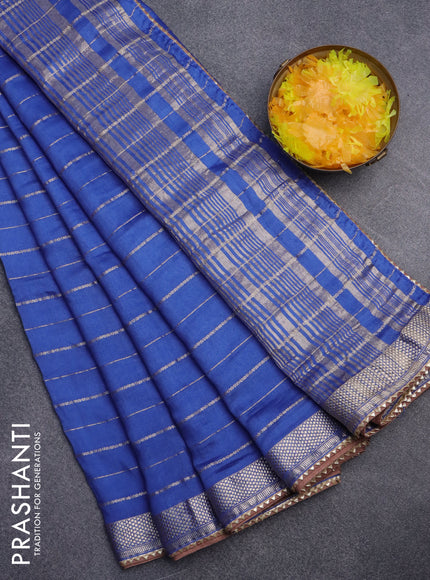 Semi chanderi saree blue and brown with allover zari woven stripes pattern and zari woven & gotapatti lace work border