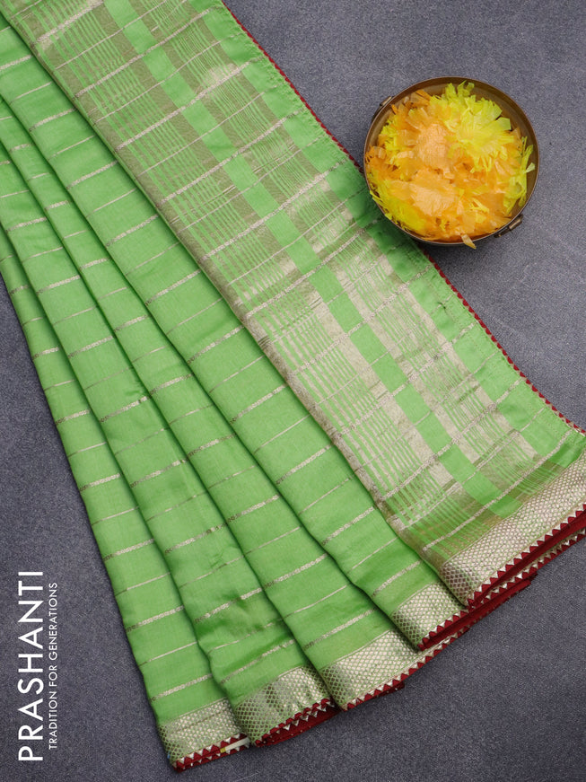 Semi chanderi saree light green and red with allover zari woven stripes pattern and zari woven & gotapatti lace work border