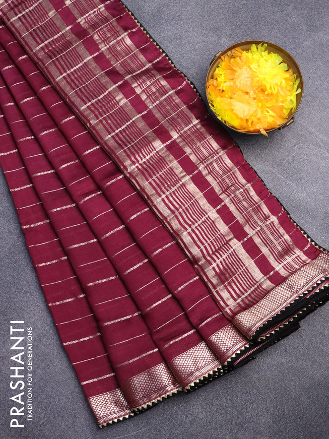 Semi chanderi saree wine shade and black with allover zari woven stripes pattern and zari woven & gotapatti lace work border