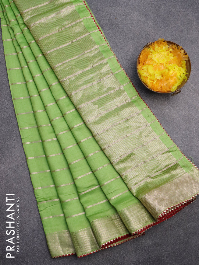 Semi chanderi saree light green and red with allover zari woven stripes pattern and zari woven & gotapatti lace work border