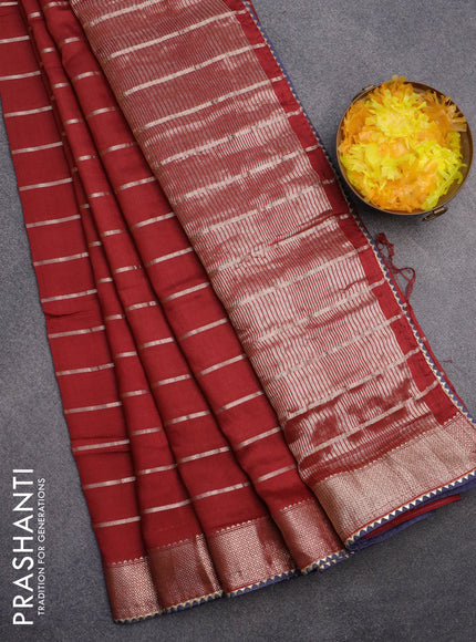 Semi chanderi saree maroon and blue with allover zari woven stripes pattern and zari woven & gotapatti lace work border