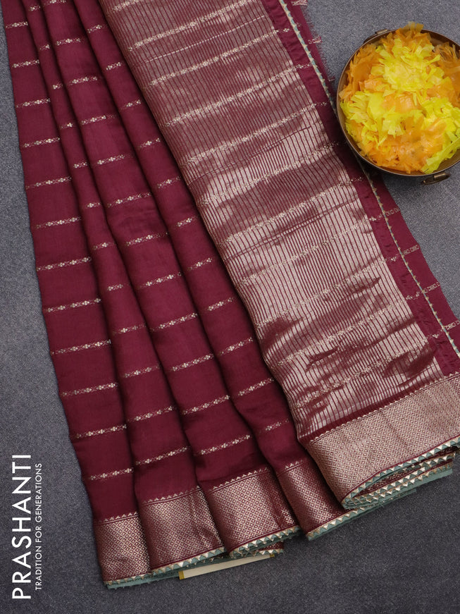 Semi chanderi saree maroon and pastel green with allover zari woven stripes pattern and zari woven & gotapatti lace work border