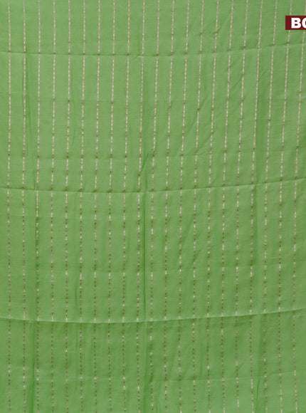 Semi chanderi saree light green and grey with allover zari woven stripes pattern and zari woven & gotapatti lace work border