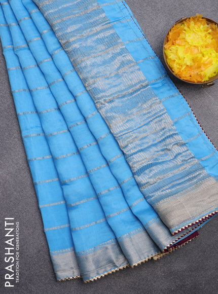 Semi chanderi saree light blue and purple with allover stripes pattern and zari woven & gotapatti lace work border