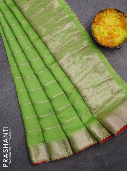 Semi chanderi saree light green and red with allover stripes pattern and zari woven & gotapatti lace work border