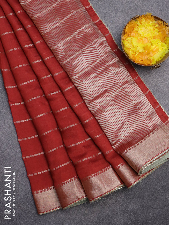 Semi chanderi saree maroon and pastel green with allover stripes pattern and zari woven & gotapatti lace work border