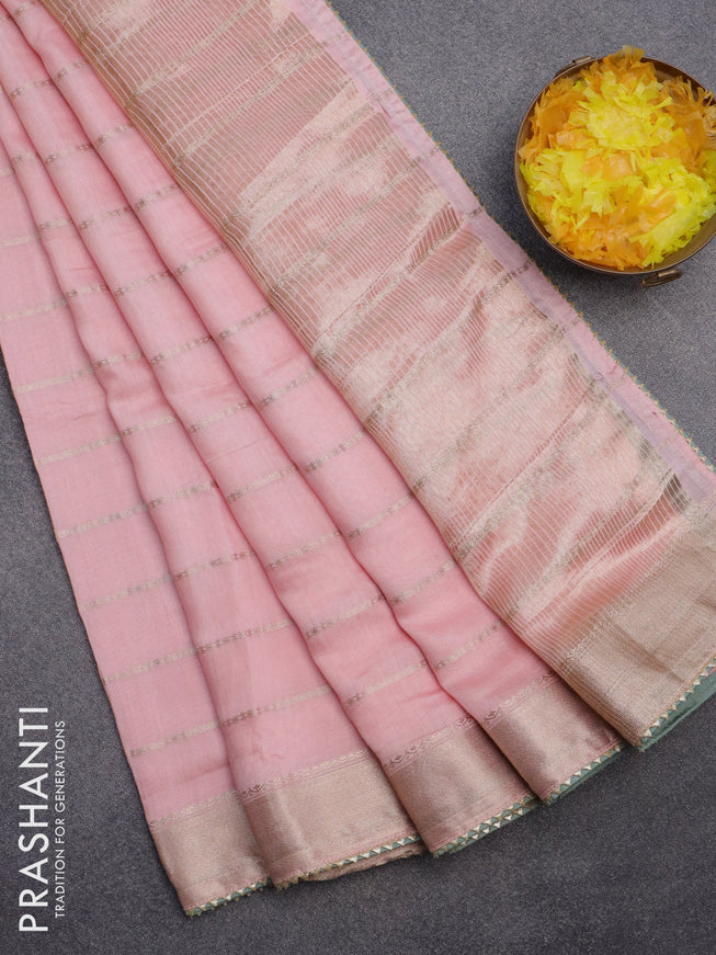 Semi chanderi saree pastel pink and pastel green with allover stripes pattern and zari woven & gotapatti lace work border