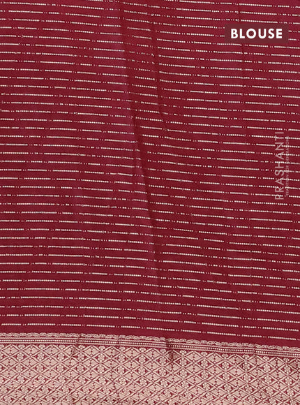 Semi chanderi saree maroon and green with allover zari weaves and zari woven & gotapatti lace work border