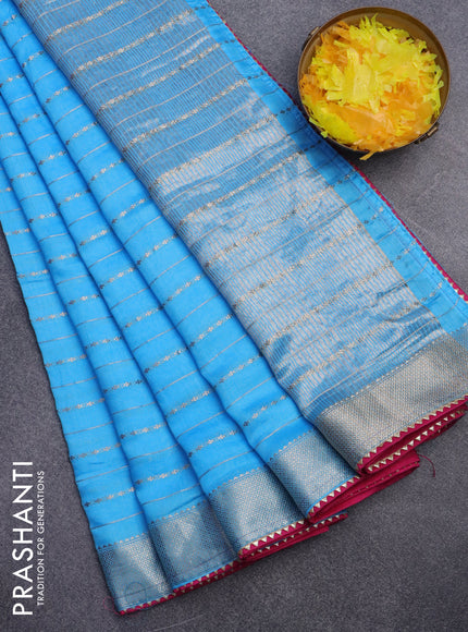 Semi chanderi saree light blue and pink with allover zari weaves and zari woven & gotapatti lace work border