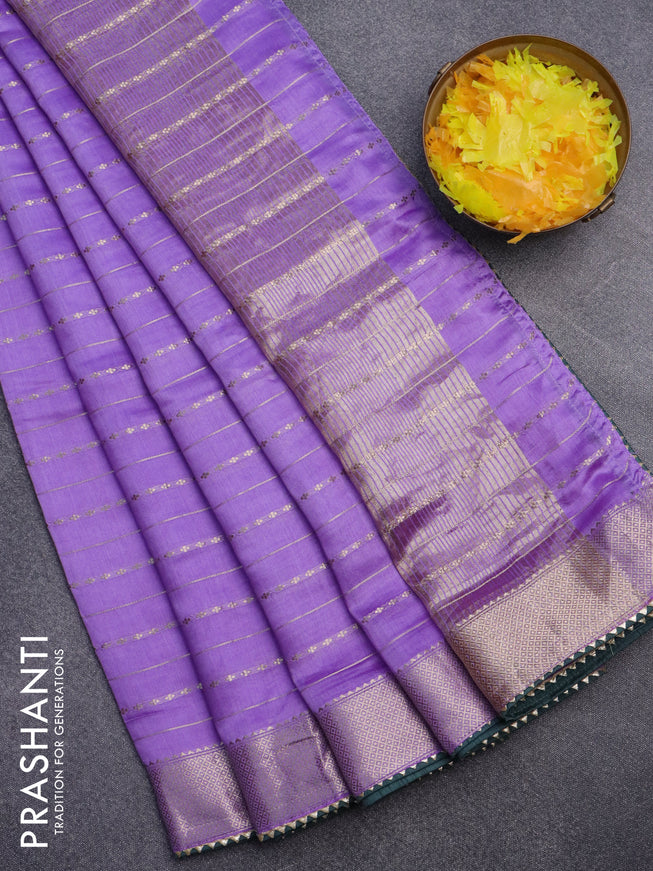 Semi chanderi saree lavender shade and green with allover zari weaves and zari woven & gotapatti lace work border