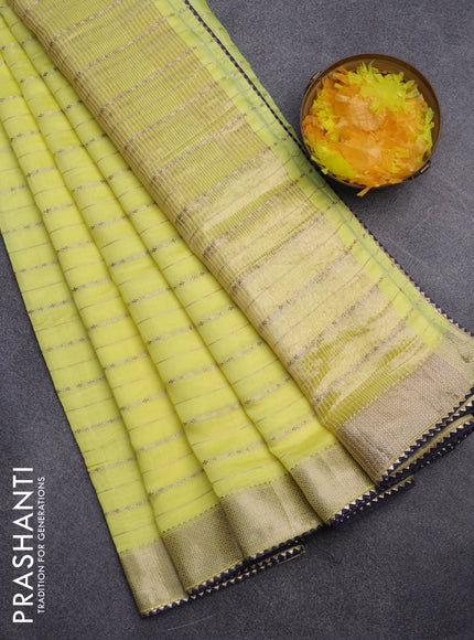 Semi chanderi saree lime yellow and blue with allover zari weaves and zari woven & gotapatti lace work border