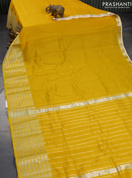 Mangalgiri silk cotton saree yellow and elephant grey with plain body and silver zari woven border & hand painted kalamkari blouse