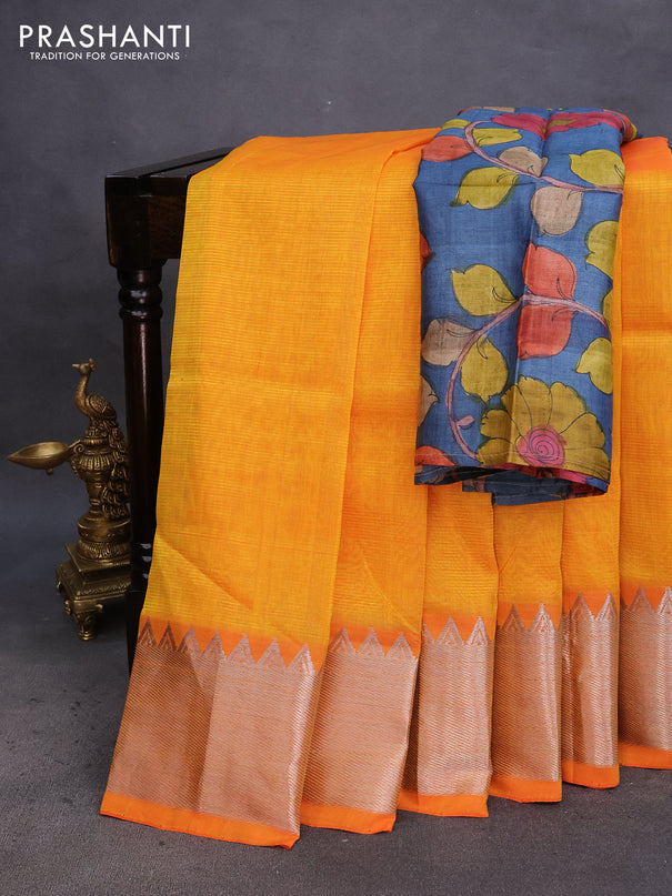 Mangalgiri silk cotton saree dual shade of yellowish orange and dark blue with plain body and silver zari woven border & hand painted kalamkari blouse