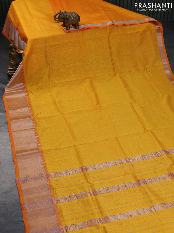 Mangalgiri silk cotton saree dual shade of yellowish orange and dark blue with plain body and silver zari woven border & hand painted kalamkari blouse