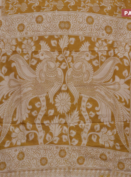 Kalamkari semi silk saree mustard yellow and beige with allover prints and printed border