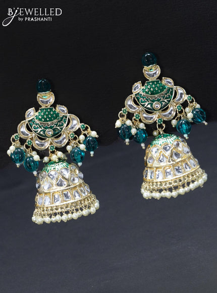 Fashion dangler teal green jhumkas with kundan stones and pearl hangings