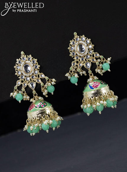 Fashion dangler light green jhumka with kundan stones and pearls & beads hangings