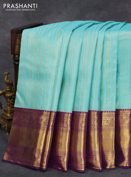 Pure kanjivaram silk saree light blue and violet with allover silver & gold zari weaves and long zari woven border