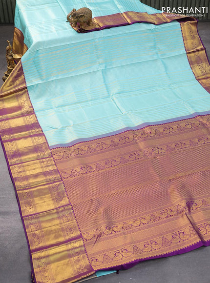 Pure kanjivaram silk saree light blue and violet with allover silver & gold zari weaves and long zari woven border