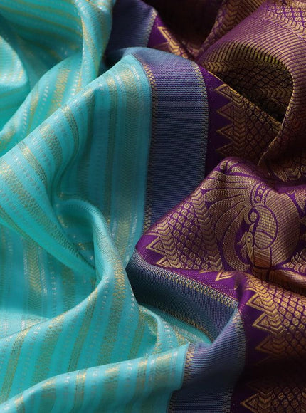 Pure kanjivaram silk saree light blue and violet with allover silver & gold zari weaves and long zari woven border