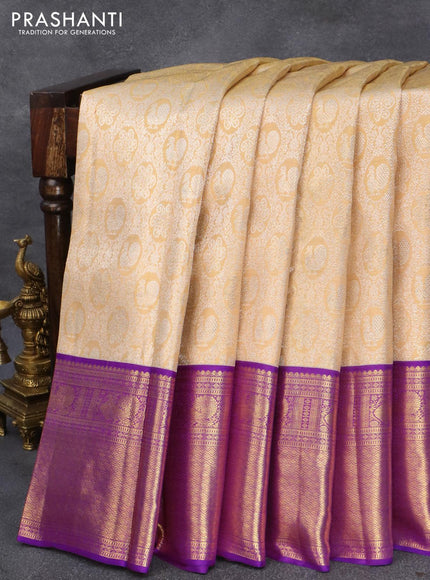 Pure kanjivaram tissue silk saree sandal and purple with allover silver zari woven brocade weaves and annam zari woven border