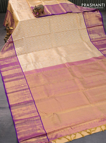 Pure kanjivaram tissue silk saree sandal and purple with allover silver zari woven brocade weaves and annam zari woven border