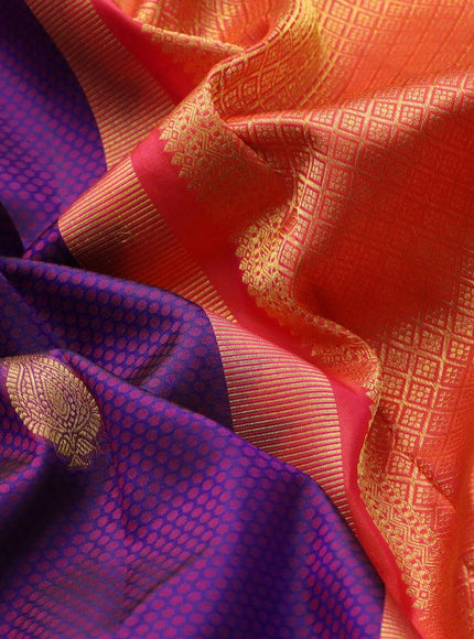 Pure kanjivaram silk saree dark blue and dual shade of pinkish orange with allover self emboss & zari buttas and rich zari woven border