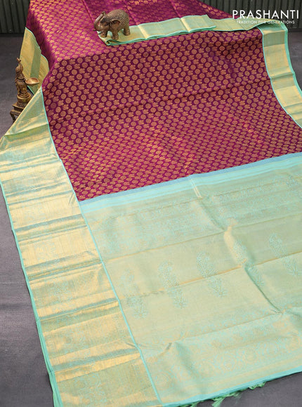 Pure kanjivaram silk saree deep purple and teal blue shade with allover annam zari woven butta weaves and rich zari woven border