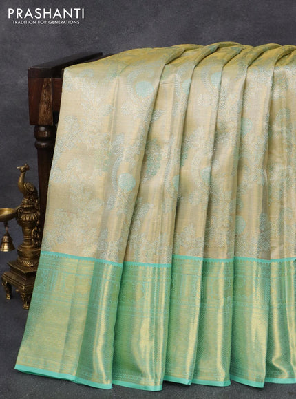 Pure kanjivaram tissue silk saree cream and teal blue with allover zari woven brocade weaves and zari woven border