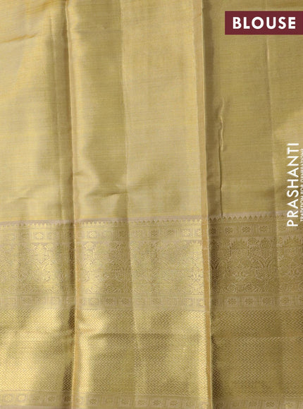 Pure kanjivaram tissue silk saree gold with allover zari woven brocade weaves and long zari woven border