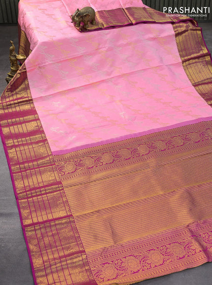 Pure kanjivaram silk saree light pink and pink with allover zari weaves and long zari woven border