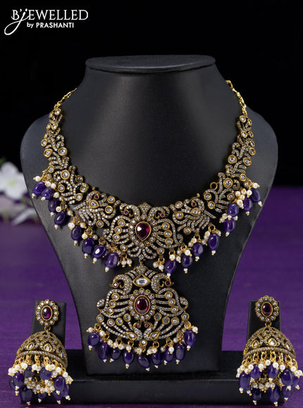 Necklace violet with kemp & cz stones and beads hangings