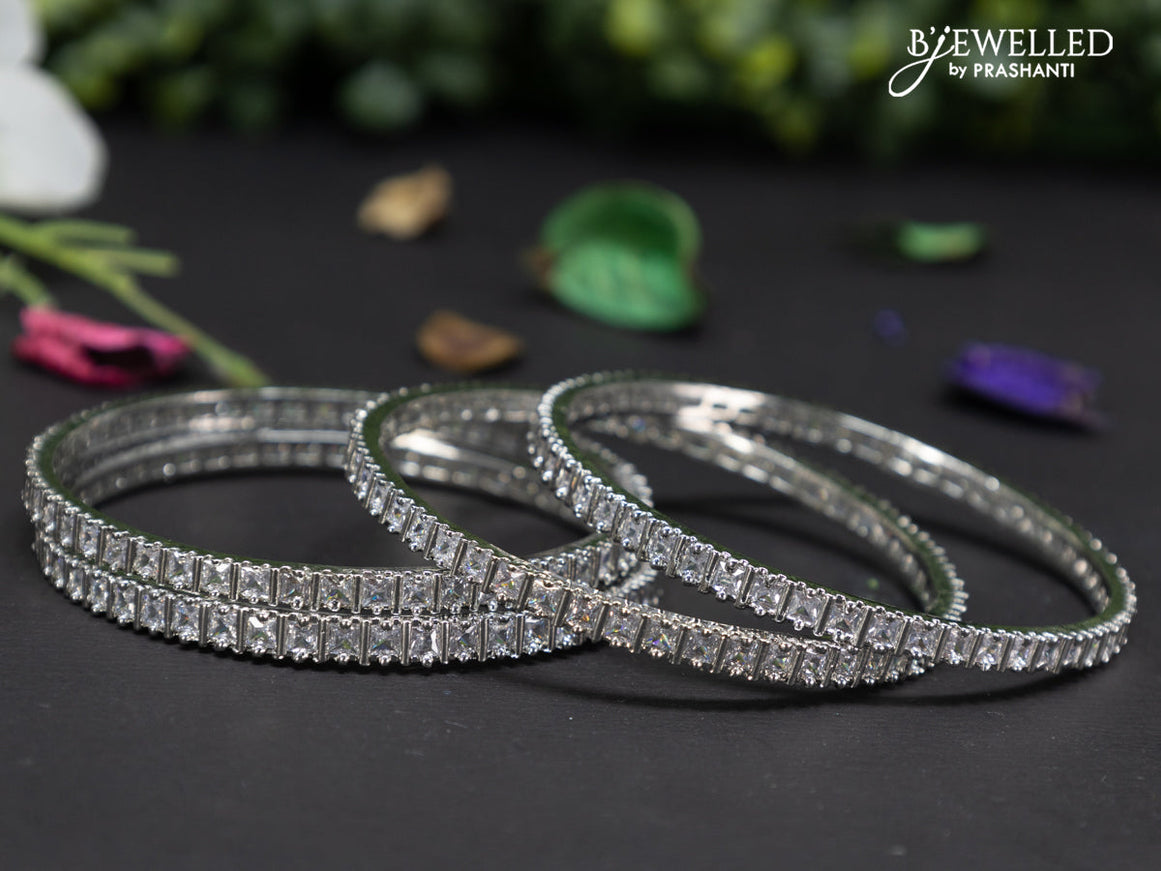 Zircon bangles with cz stones