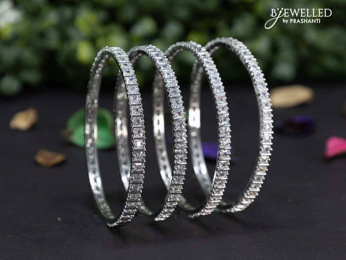 Zircon bangles with cz stones