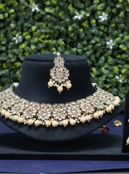 Kundan necklace with pearl hangings and maang tikka