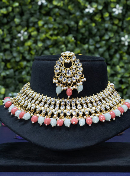 Kundan choker with beads hanging and maang tikka