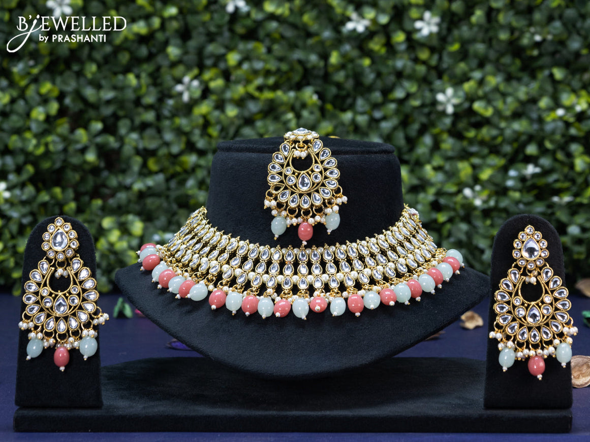 Kundan choker with beads hanging and maang tikka